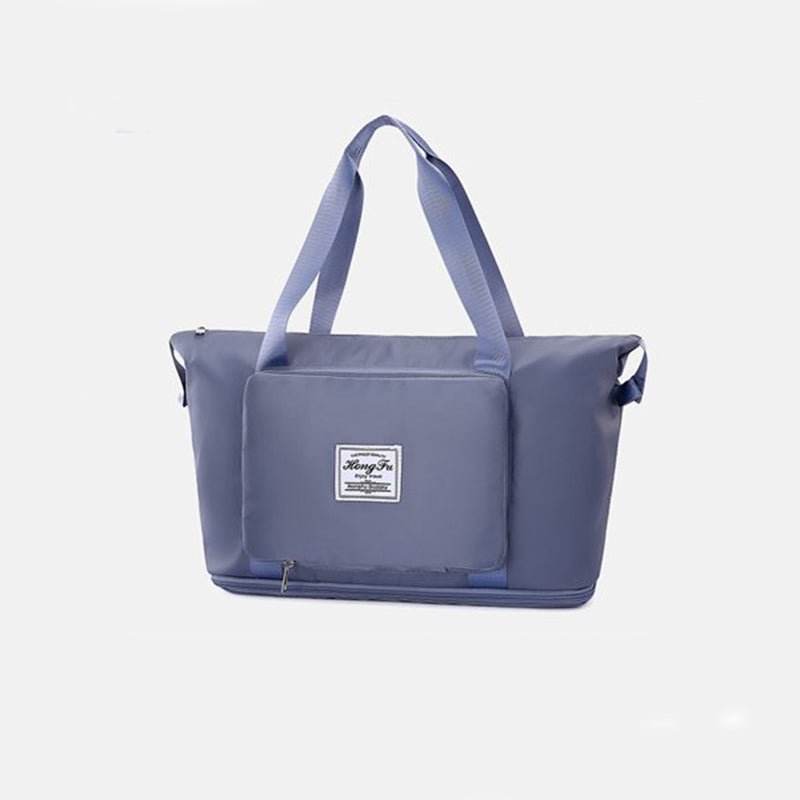 Travel Gym Bag – Foldable, Waterproof & Large Capacity in blue color, perfect for gym and travel.
