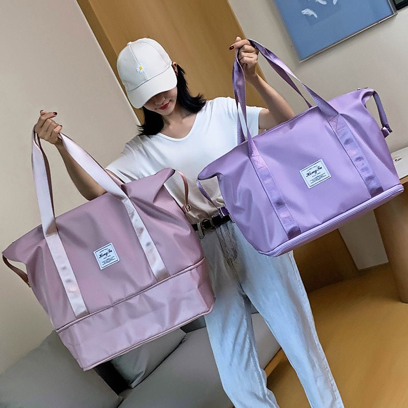 Model showcasing a Travel Gym Bag in pink and purple, highlighting its spacious design and stylish look.